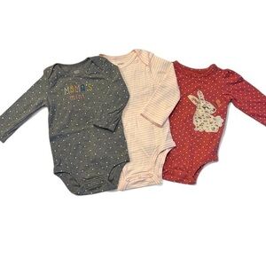 Carter’s long sleeved onesies size 9 months